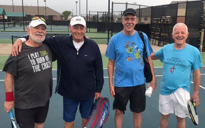 Adult tennis drill group